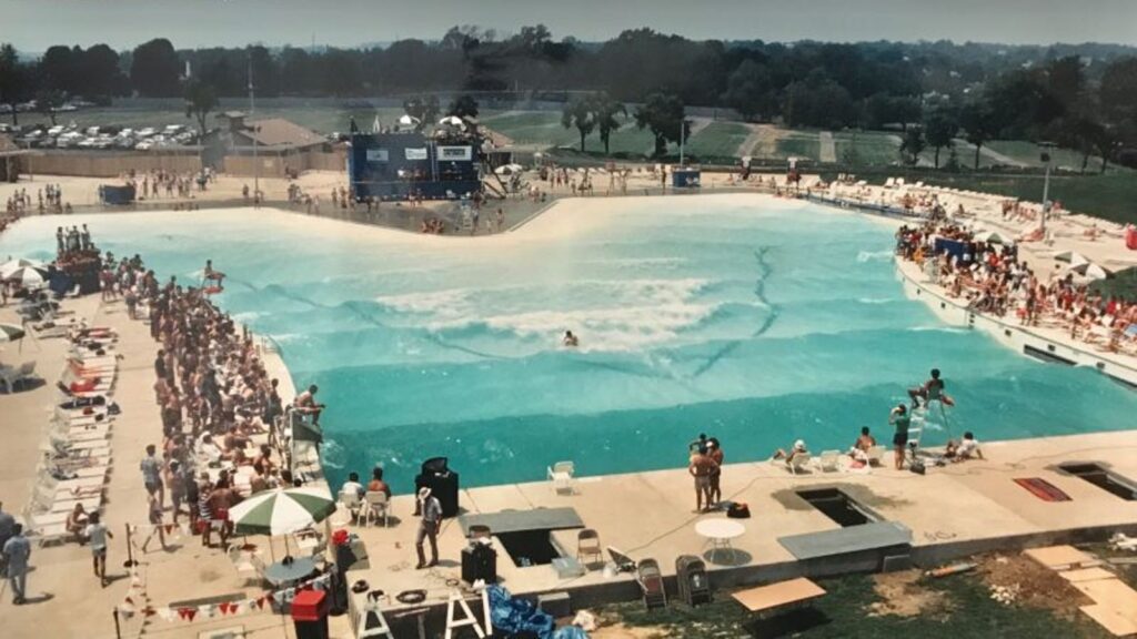 Postcard from the 80s depicting the first pro surf contest in a wave pool