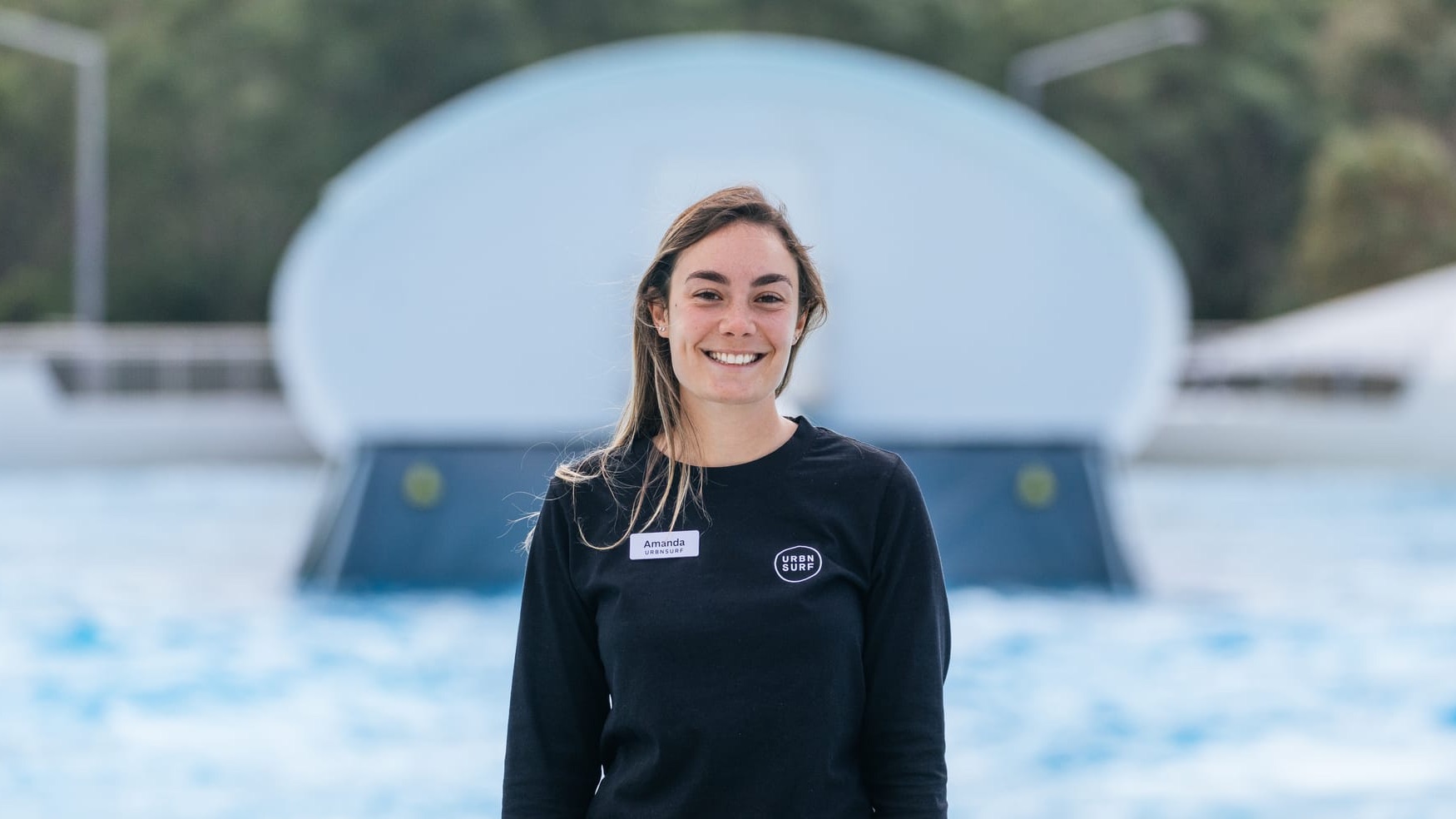 Amanda Nestor overseeing surf guides and lifeguards at URBNSURF surf park.