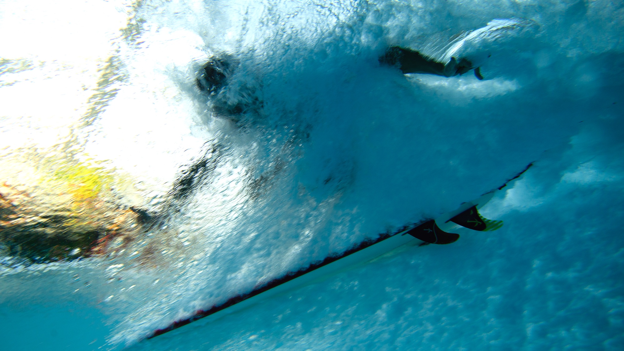 surfer as seen from underwater