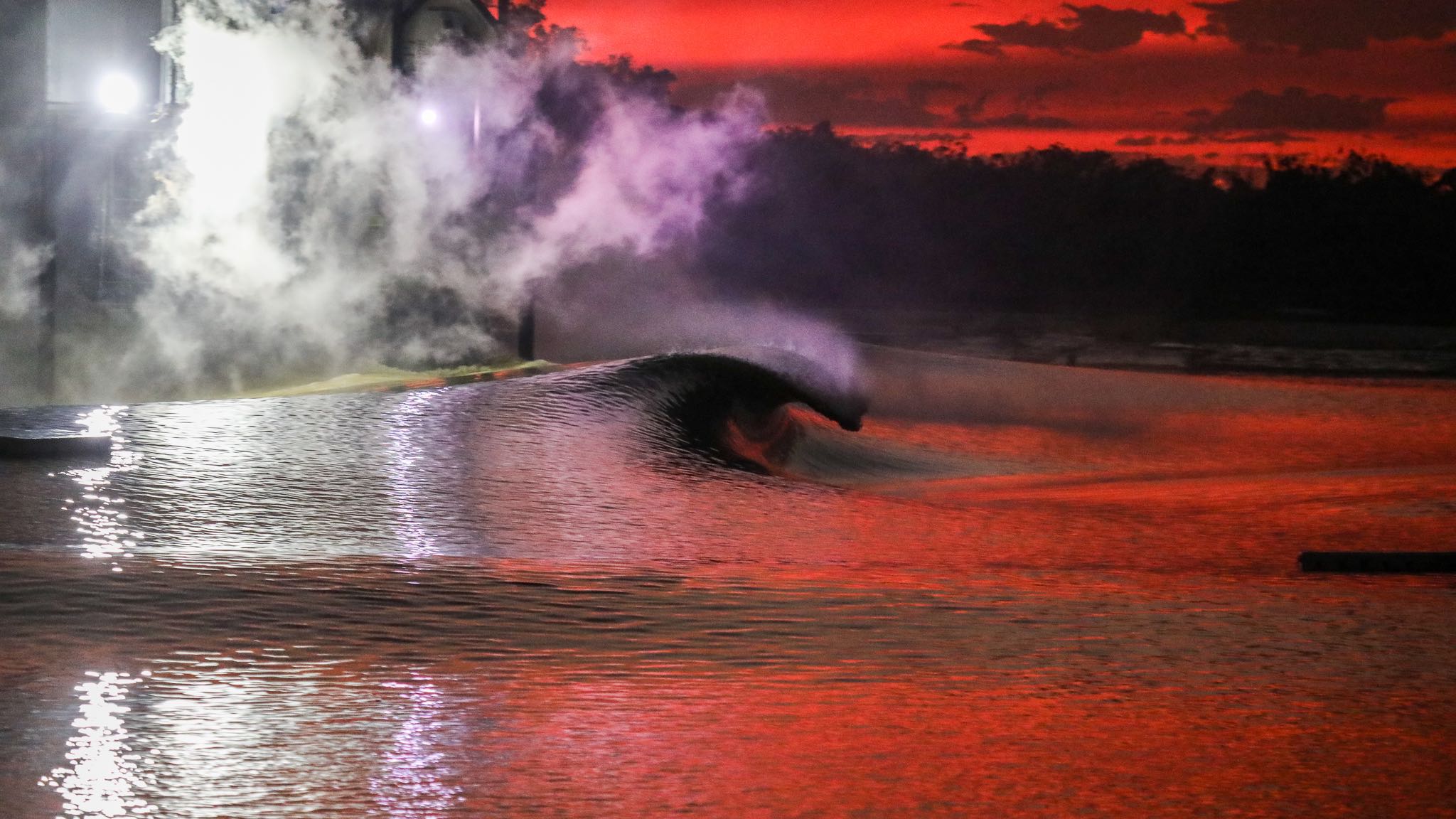 Surf Lakes wave pool in red light