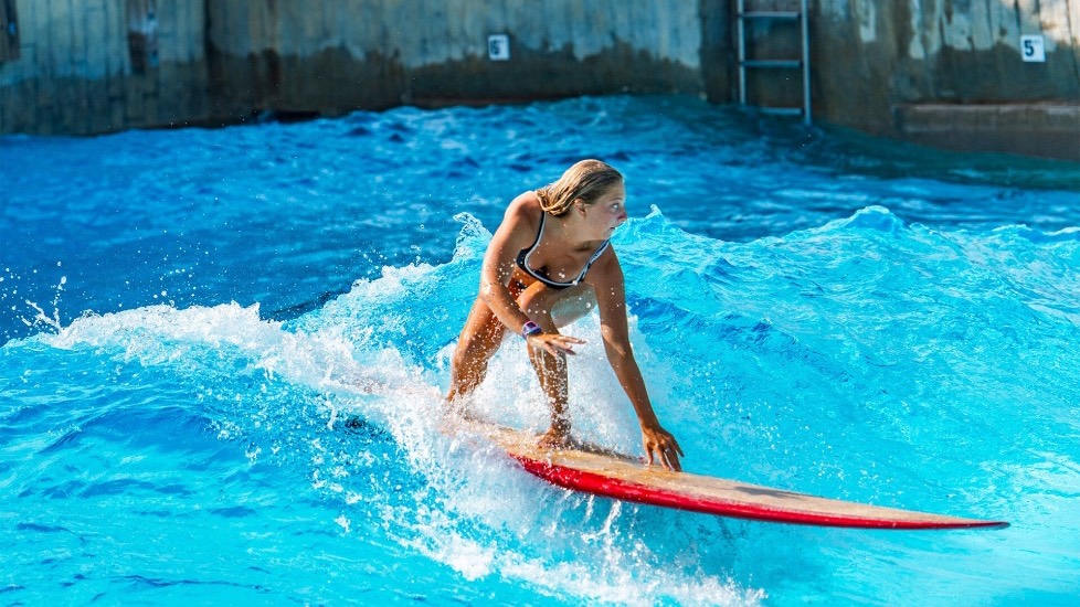 Cam Hoover longboarding a wave pool