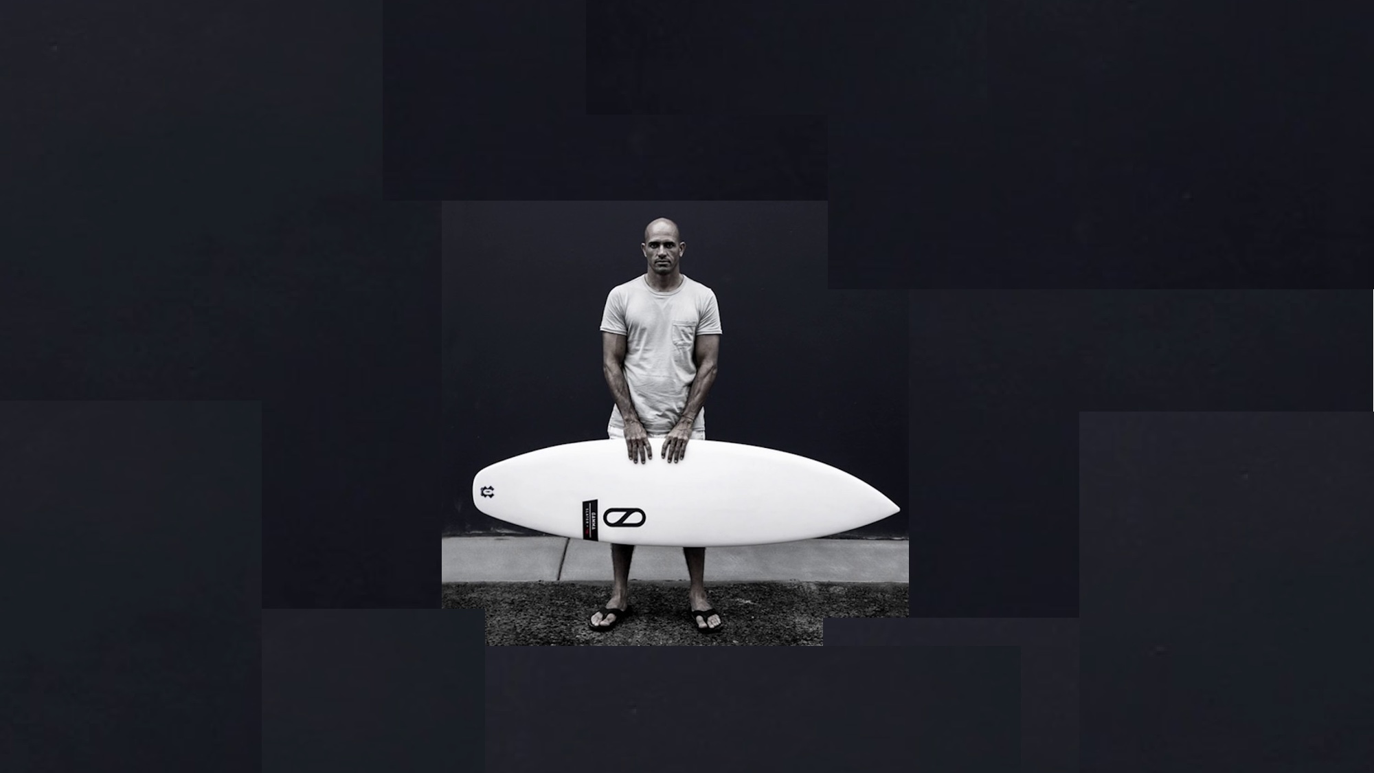 kelly slater with surfboard