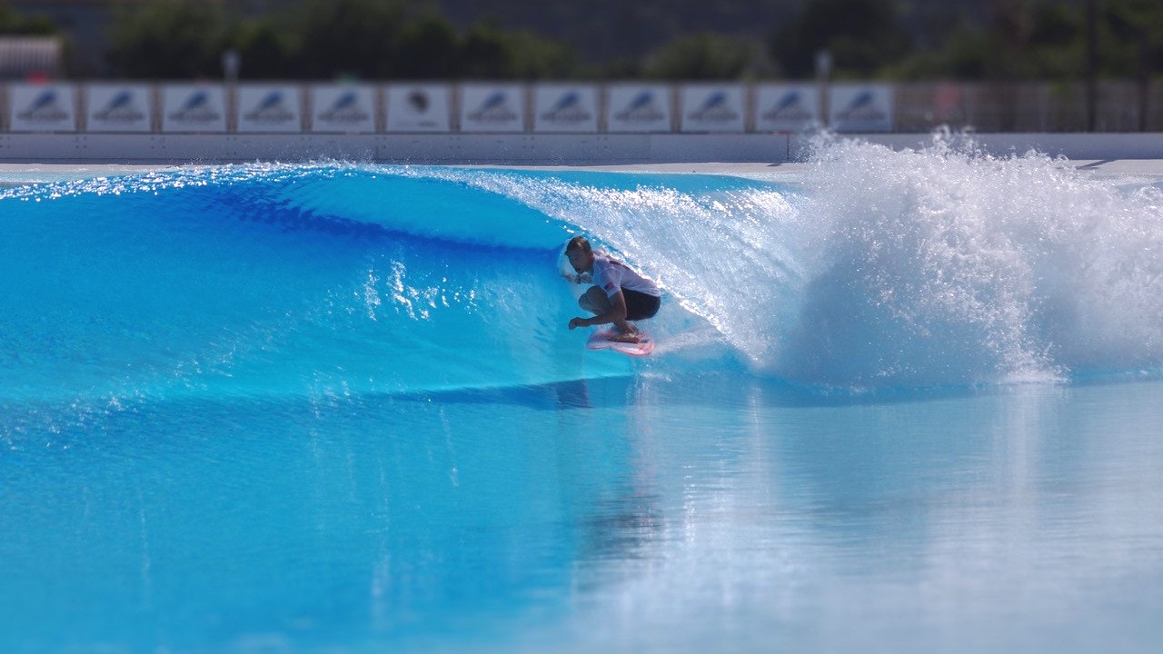 wave pool travel : image shows kolohe andino in the tube at Surf Stadium Japan